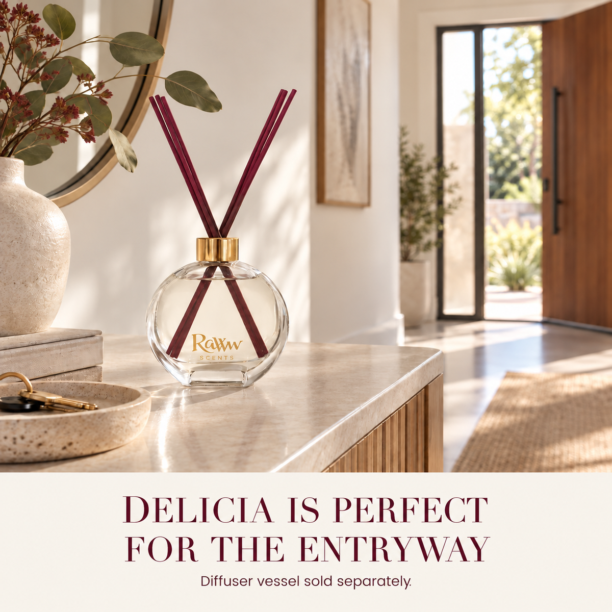 Delicia reed diffuser styled in an entryway