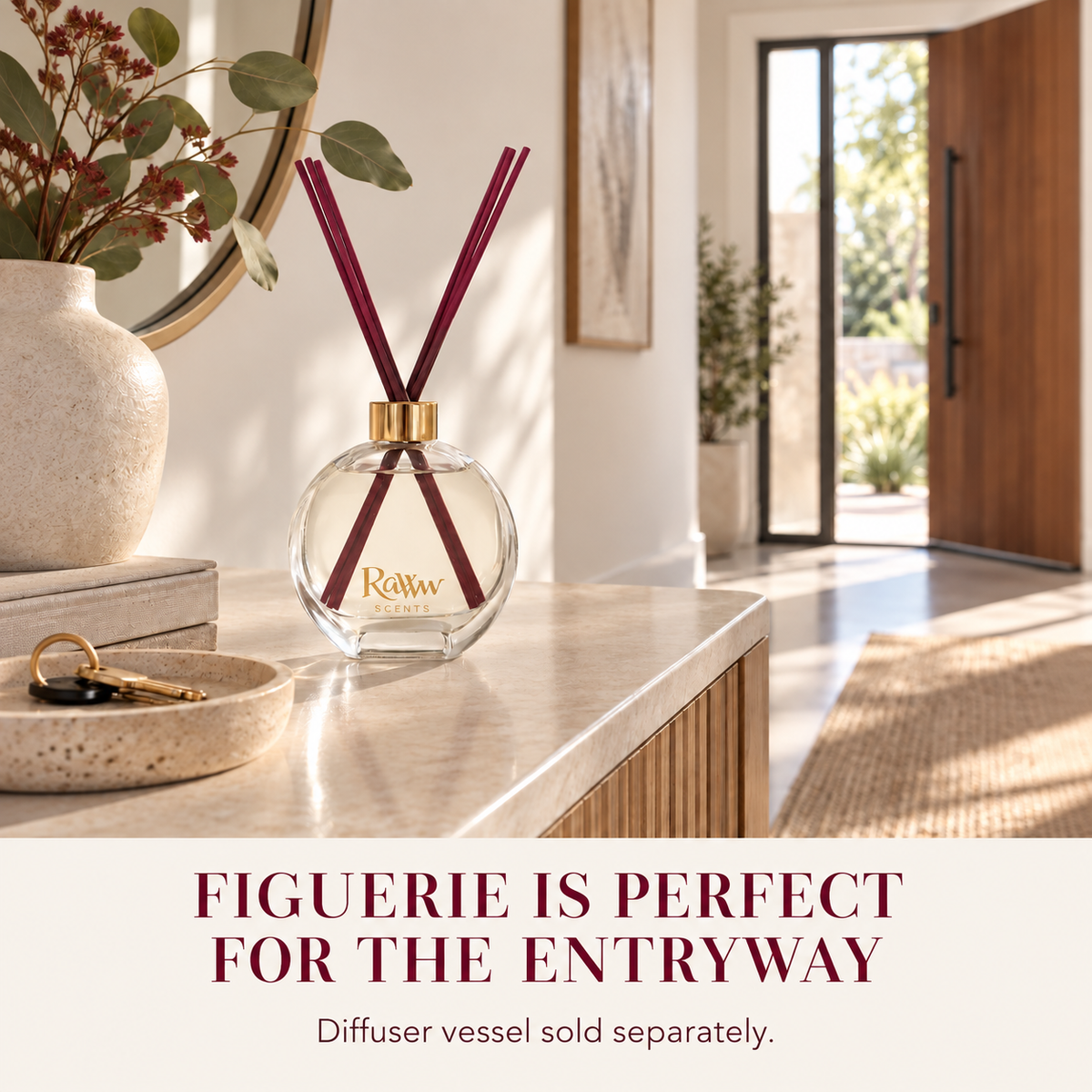 Figuerie reed diffuser styled in an entryway