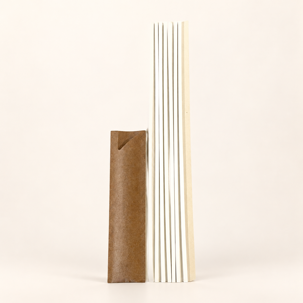 Seven Ivory diffuser reeds laid out