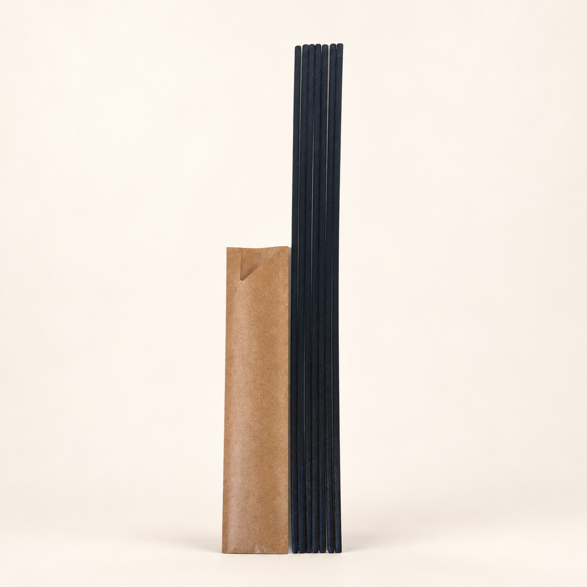 Seven Ebony diffuser reeds laid out